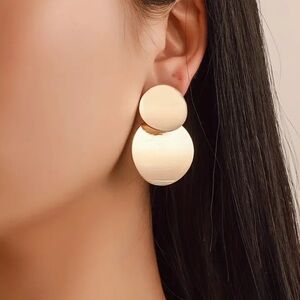 Golden Geometric Dangle Earrings.